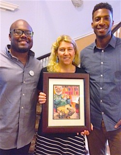 Lucas and Anthony Grimes present a tribute to their mentor “Uncle” Vincent Harding to Rev. Kristin Stoneking (FOR)