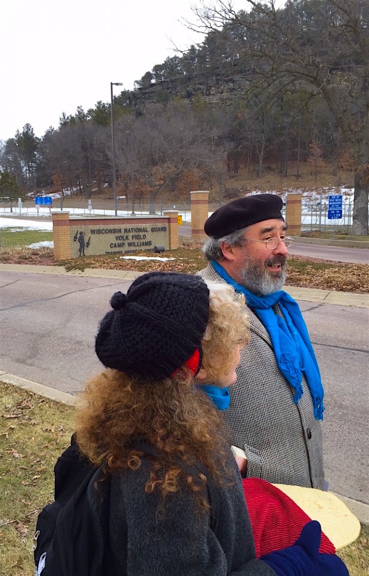 Voices for Creative Nonviolence activists enter a military drone base with a loaf of bread